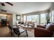 Cozy living room with neutral tones, comfortable seating, and natural light for a serene and inviting ambiance at 794 Oakmont Ave # 106, Las Vegas, NV 89109