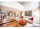 Open-concept living area with a grand piano, comfortable seating, and elegant decor at 794 Oakmont Ave # 106, Las Vegas, NV 89109
