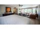 Bright main bedroom boasts a seating area, dresser, and lovely decor at 794 Oakmont Ave # 106, Las Vegas, NV 89109