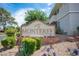The 'Monterey' sign welcomes you with lush landscaping and colorful flowers, setting a welcoming community tone at 794 Oakmont Ave # 106, Las Vegas, NV 89109