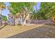 View of backyard and rear of home with patio and block wall at 8231 Burnt Sienna St, Las Vegas, NV 89123