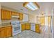 Well-equipped kitchen featuring granite countertops, updated appliances, and ample cabinet space at 8231 Burnt Sienna St, Las Vegas, NV 89123