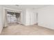 Bedroom with neutral carpet and large sliding door to exterior patio at 848 Hedge Way # 5, Las Vegas, NV 89110