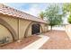 Charming single-story home featuring arched entryways, desert landscaping, and a tile roof at 848 Hedge Way # 5, Las Vegas, NV 89110