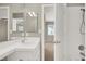 Bright bathroom with white vanity and walk-in shower at 8612 Chiquita Dr, Las Vegas, NV 89128