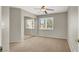 Bedroom with mirrored closet and shuttered windows at 8612 Chiquita Dr, Las Vegas, NV 89128
