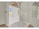 Inviting entry showcases a white front door with sidelights and tile flooring at 8612 Chiquita Dr, Las Vegas, NV 89128