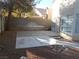 Backyard features mature landscaping, a patio, a privacy wall, and desert landscaping at 9709 Port Orange Ln, Las Vegas, NV 89134