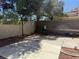 Private backyard with patio is shaded by mature trees and offers outdoor living at 9709 Port Orange Ln, Las Vegas, NV 89134