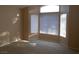 Bedroom featuring natural light and plush carpeting at 9709 Port Orange Ln, Las Vegas, NV 89134