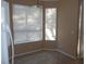 Bright breakfast nook with tile flooring and sunny windows at 9709 Port Orange Ln, Las Vegas, NV 89134