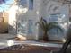 Exterior elevation of home featuring desert landscaping and a palm tree at 9709 Port Orange Ln, Las Vegas, NV 89134