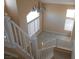 View of staircase with abundant natural light and chandelier from above at 9709 Port Orange Ln, Las Vegas, NV 89134