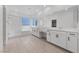 A full bathroom with double sinks, tile floor, a glass enclosed shower, and a separate tub at 9839 Berkley Brook Ct, Las Vegas, NV 89141