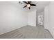 Bedroom featuring neutral carpet, a ceiling fan, and white walls at 9839 Berkley Brook Ct, Las Vegas, NV 89141