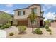 Charming two-story home featuring a two-car garage and a beautifully landscaped front yard at 9839 Berkley Brook Ct, Las Vegas, NV 89141