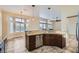 Kitchen features stainless steel appliances, granite countertops, and a breakfast bar at 9920 Netherton Dr, Las Vegas, NV 89134