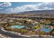 This aerial view highlights a community featuring a pool, clubhouse, tennis courts, and manicured landscaping at , Las Vegas, NV 89135