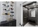 An elevator is conveniently located near a curated wine display at , Las Vegas, NV 89135