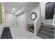 The home's entryway features a modern design, stylish decor, and elegant staircase at , Las Vegas, NV 89135