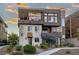 A modern two-story home features a contemporary design, landscaped yard and inviting entrance at , Las Vegas, NV 89135