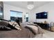 Inviting main bedroom with city views offers comfortable bedding and contemporary furnishings at , Las Vegas, NV 89135