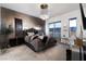 This is a main bedroom featuring a textured accent wall, modern lighting, and access to a private balcony with views at , Las Vegas, NV 89135