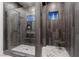 Modern shower with glass door, sleek fixtures, and stylish gray tile surround, offering spa-like experience at , Las Vegas, NV 89135