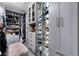 Organized walk-in closet with custom shelving provides ample storage for clothes, shoes, and accessories at , Las Vegas, NV 89135
