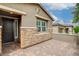 Close up of the front exterior with a beautiful front door, and a gated courtyard at 10182 Skye Run Ave, Las Vegas, NV 89166