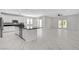 Open kitchen with a large island and access to the dining and living area at 10182 Skye Run Ave, Las Vegas, NV 89166