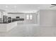 Bright kitchen boasts white cabinets, granite counters, and stainless steel appliances at 10182 Skye Run Ave, Las Vegas, NV 89166