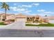 Charming single-story home with desert landscaping, an attached garage, and a wide driveway at 10508 Snyder Ave, Las Vegas, NV 89134