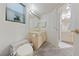 Cozy bathroom featuring neutral finishes, a single sink vanity, and good lighting at 1060 Calico Ridge Dr, Henderson, NV 89011