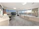Sun-filled bonus room with built-ins, large windows, and views of the pool at 1060 Calico Ridge Dr, Henderson, NV 89011