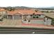 Exterior elevation of a beautiful home with a well-maintained lawn and desert landscaping at 1060 Calico Ridge Dr, Henderson, NV 89011