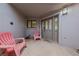 Welcoming front porch with decorative chairs and a stylish front door at 1060 Calico Ridge Dr, Henderson, NV 89011