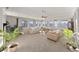 Bright, spacious living room featuring neutral tones, ample natural light, and comfortable seating arrangements at 1060 Calico Ridge Dr, Henderson, NV 89011