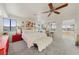 Serene main bedroom features ample light, a ceiling fan, and ample space at 1060 Calico Ridge Dr, Henderson, NV 89011