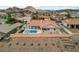 Stunning aerial view of a home with a private pool and desert landscaping at 1060 Calico Ridge Dr, Henderson, NV 89011