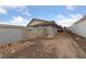 Side yard with secure fencing, desert landscaping, and gate at 1060 Calico Ridge Dr, Henderson, NV 89011