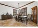 Formal dining room features custom window treatments and wood accents at 10674 Chillingham Dr, Las Vegas, NV 89183