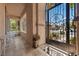 Charming front porch with decorative ironwork, comfortable seating, and a welcoming entrance at 10674 Chillingham Dr, Las Vegas, NV 89183