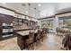 Kitchen features granite countertops, a large island with seating, and stainless steel appliances at 10674 Chillingham Dr, Las Vegas, NV 89183