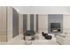 Modern living room and dining area with elegant seating, fireplace, and stylish decor at 1224 Powerpack Ct, Henderson, NV 89012