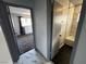 Hallway with sleek floors leading to bedroom and bathroom at 1304 Bonita Ave, Las Vegas, NV 89104