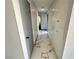 Long hallway featuring marble-like tile flooring and built in storage cabinets at 1304 Bonita Ave, Las Vegas, NV 89104