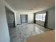 Open-concept living space featuring marble-like tile flooring and lots of natural light at 1304 Bonita Ave, Las Vegas, NV 89104