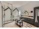 Contemporary bathroom with walk-in shower, soaking tub, and dual vanity at 1314 Doggett Ave, Las Vegas, NV 89123