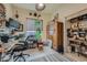Bright bedroom with desk, large wardrobe, and ample natural light, perfect for a home office or creative space at 1314 Doggett Ave, Las Vegas, NV 89123